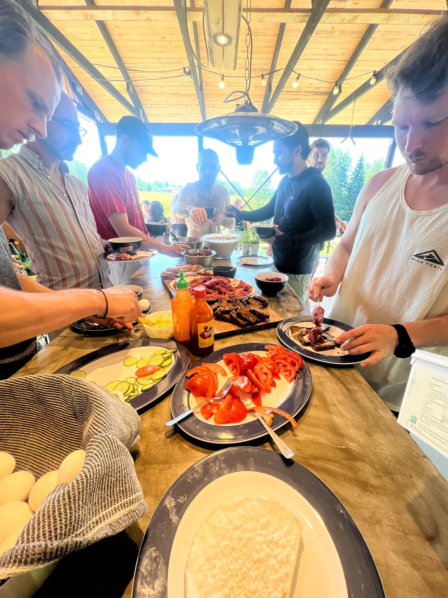 Communal meal at Breddas with local meat and vegetables