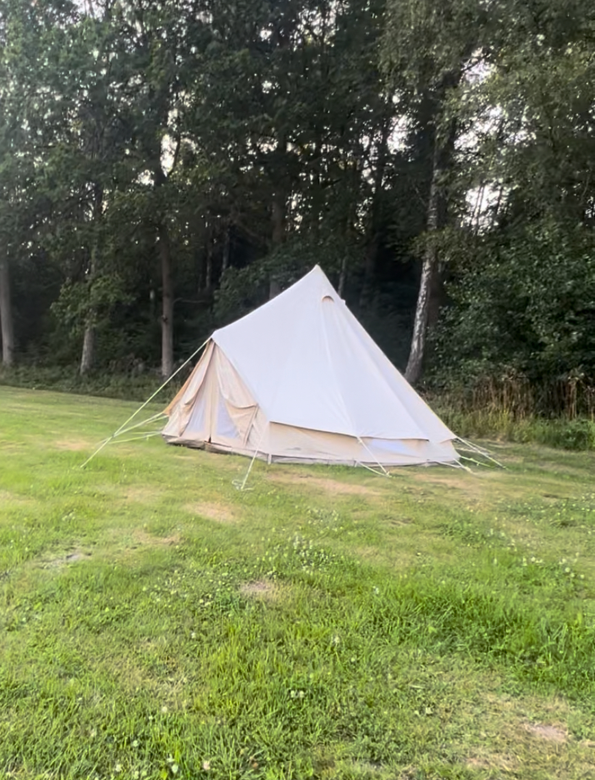 Bell tent on the grass at Breddas
